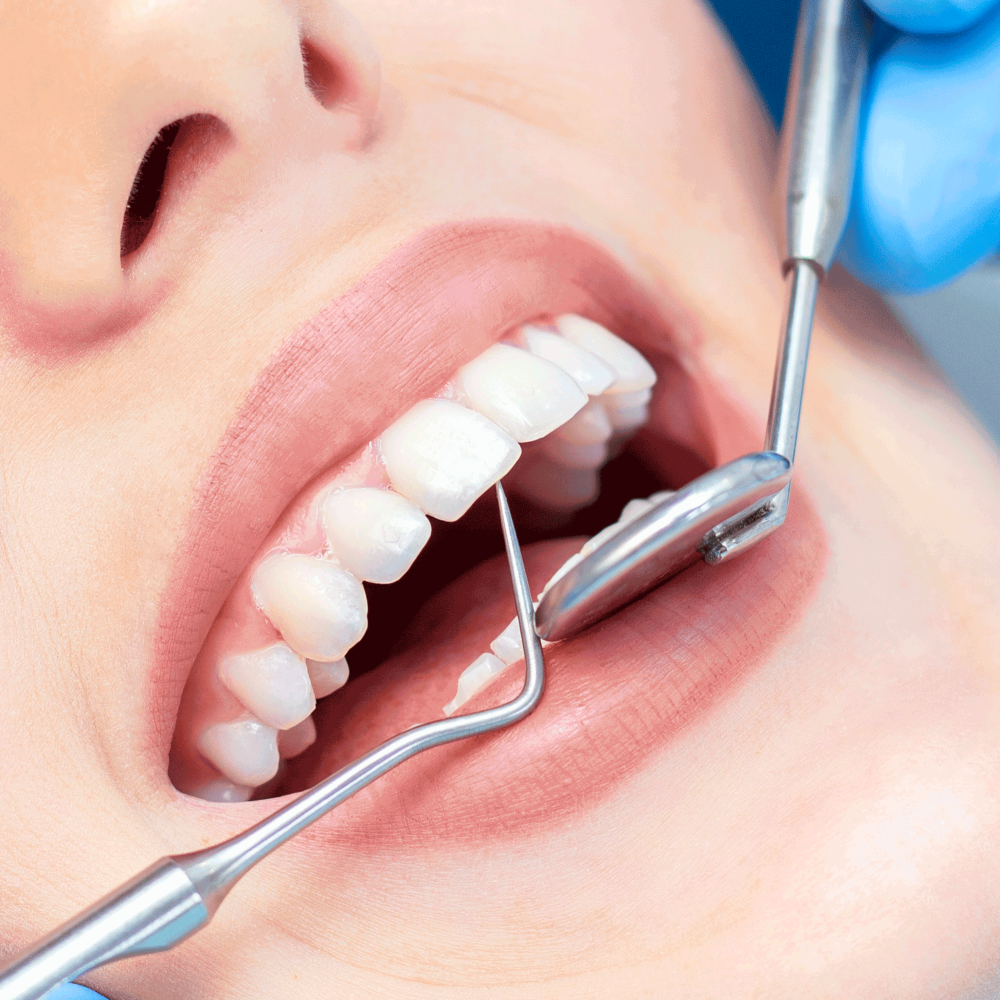 female-dentist-teeth-examination